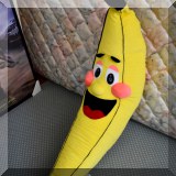 D068. Large banana pillow.